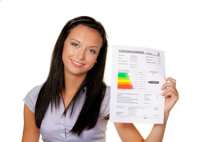 ENERGY woman with energy performance certificate shutterstock